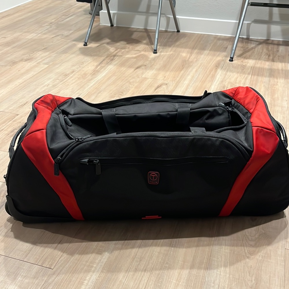 Tumi Tech Roller Bag Black and Red